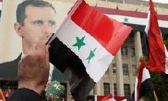 الذكرى السنوية الأولى للاحتجاجات في سوريا: النظام يستعرض قوته الشعبية.. ويواصل الحسم الأمني