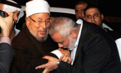 القرضاوي فـي غزة.. بين الترحيب والتنديد