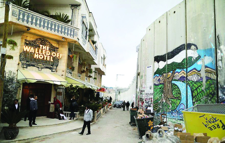 banksy-walled-off-hotel-bethlehem-palestine-1-58bd39c294c07__880