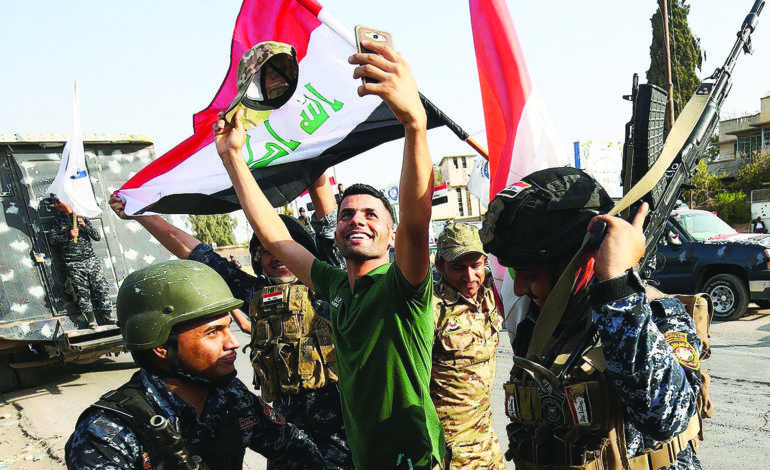 العراق يحتفل بتحرير الموصل: دويلة داعش تلفظ أنفاسها